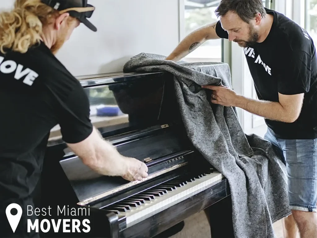 Best Miami Movers Team Members Packing Piano