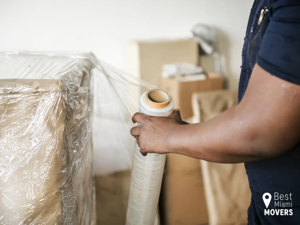 Best Miami Movers Team Member Packing Customer Box