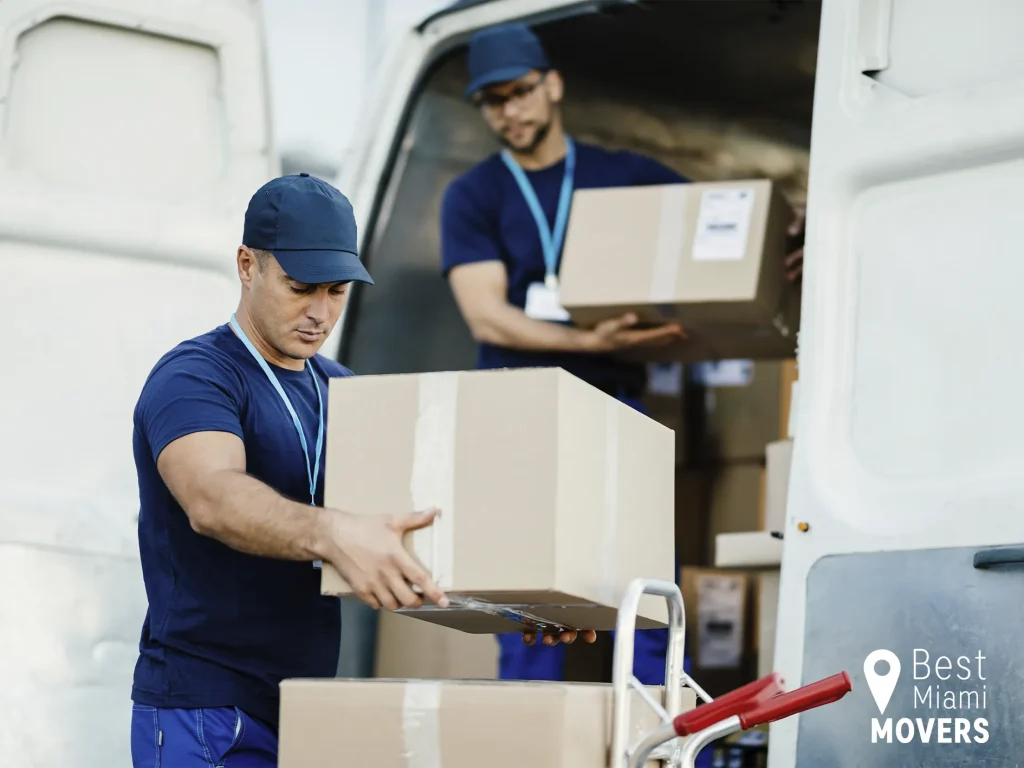 Best Miami Movers Team Members Unloading Boxes from Comercial Truck