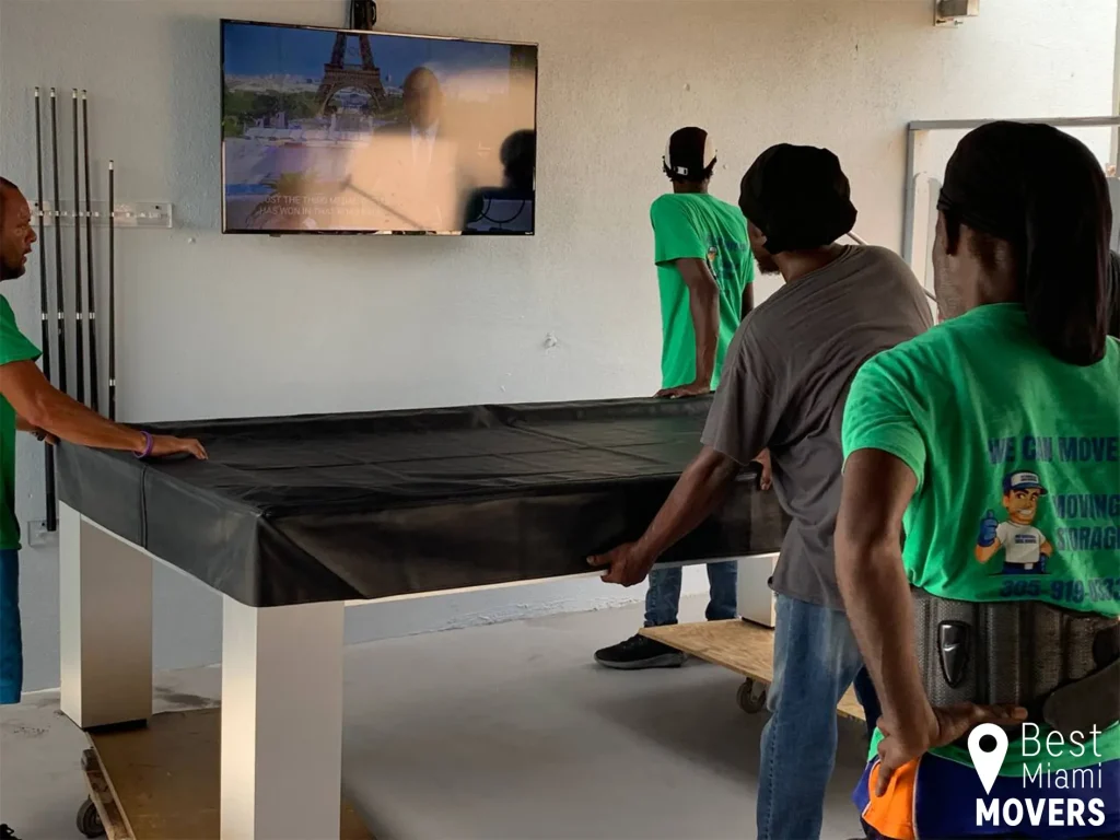 Best Miami Movers Team Members Packed Customer Pool Table