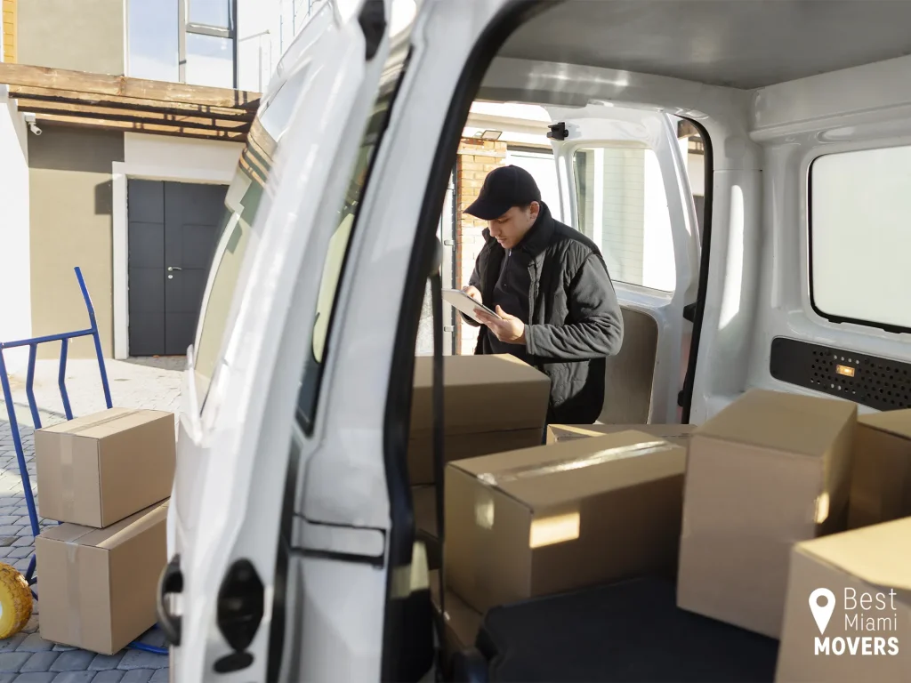 Team Member Check and Loading Boxes Best Miami Movers Winter Relocation Team Member Check and Loading Boxes