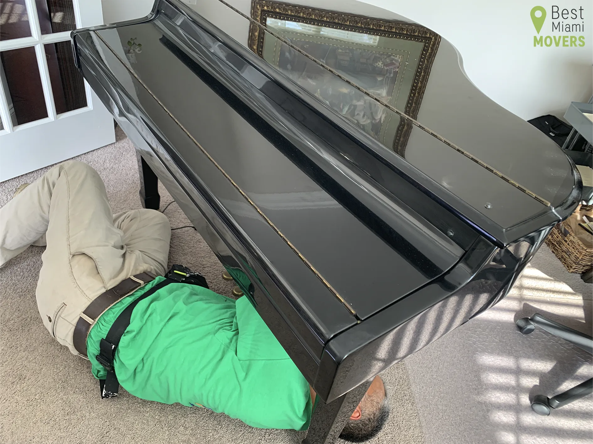 Piano Moving Team Member Prepare Instrument for Relocation