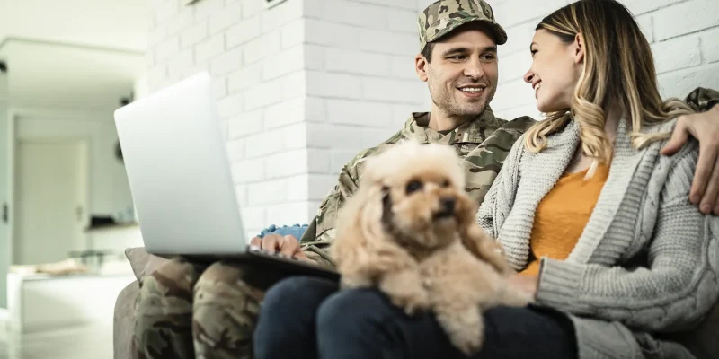 Military Relocation Customers Planning Moving Check Plan on Laptop