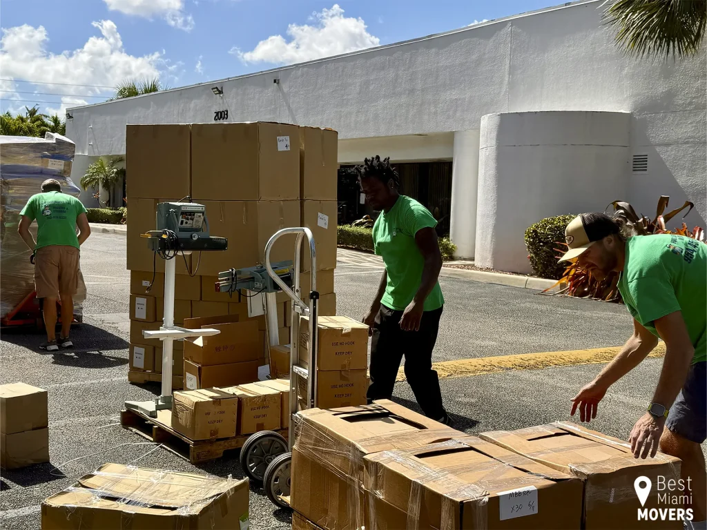 Team Member Loading Packed Customer Boxes and Furniture
