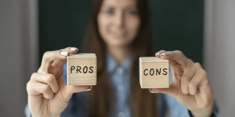 Pros and Cons October Moving Customer Take in Hands Two Cubes With Pros and Cons